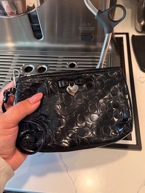 Coach Black Patent Embossed Signature Wristlet with Heart Charm